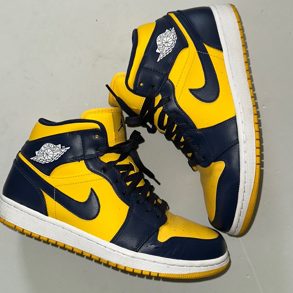 Varsity Maize, Midnight Navy and White Jordan One’s